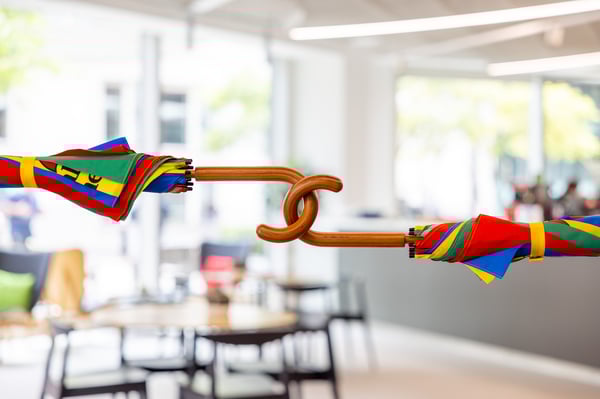 Two Legal & General umbrellas linked together